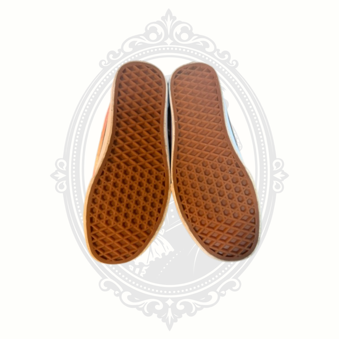 Outsole tread view of VANS sneakers showing light wear.