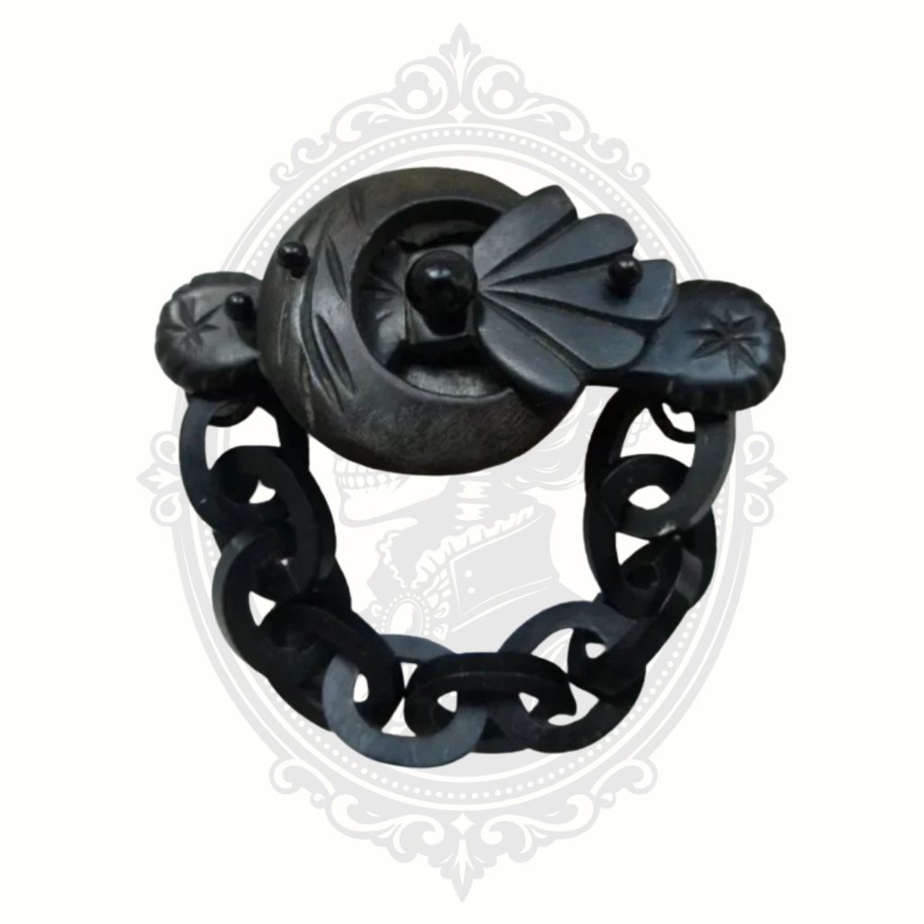 Antique Victorian mourning brooch with chain and buckle design, carved from black gutta percha, Civil War era collectible