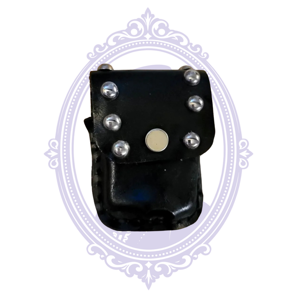 Front of black leather mini pouch with silver-tone studs