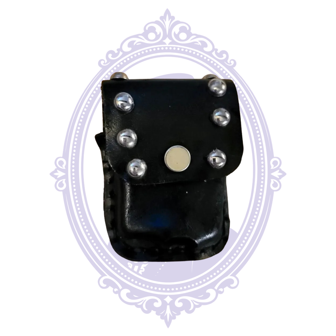 Front of black leather mini pouch with silver-tone studs