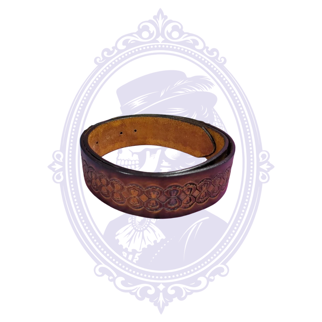 Coiled brown genuine leather belt with repeating bow-tie-shaped floral tooling, diamond details, dark shaded edges and tan leather reverse.