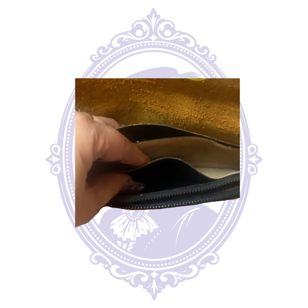 Interior view of vintage leather trucker wallet BBL-13 with separated storage compartments and black zippered pocket.