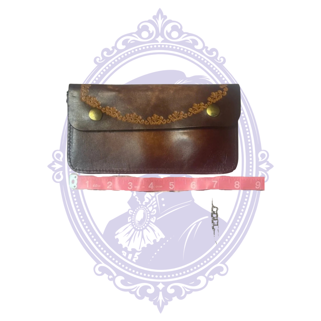 Vintage floral-tooled leather trucker wallet BBL-13 shown with measuring tape across its width.