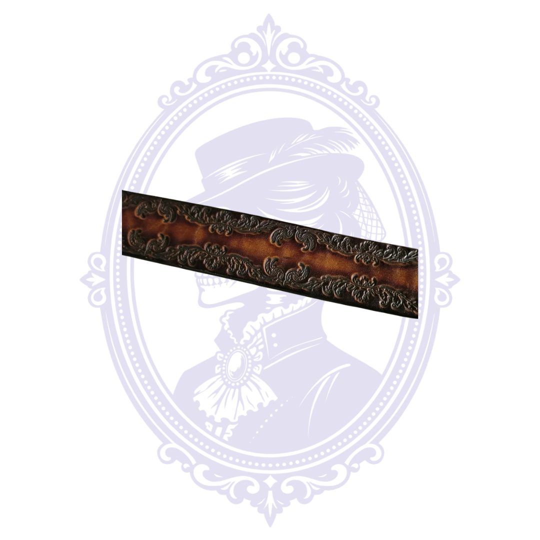 Vintage brown leather belt with elaborate dark floral tooling along both edges, size 56