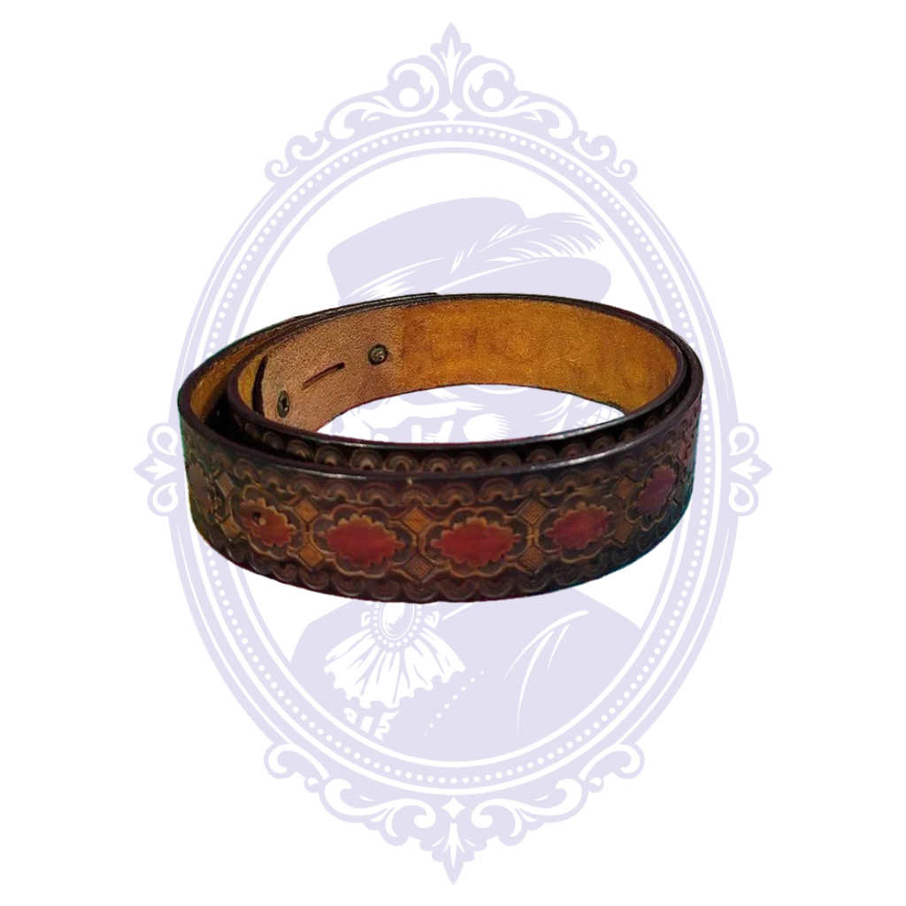 Coiled brown genuine leather belt with repeating red floral medallions, diamond motifs, decorative tooled borders and tan leather reverse.