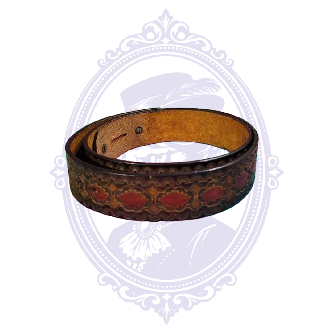 Coiled brown genuine leather belt with repeating red floral medallions, diamond motifs, decorative tooled borders and tan leather reverse.