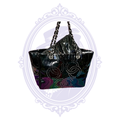 Vintage Chanel Triple Coco black patent leather tote with silver-tone chain straps and perforated CC motifs.