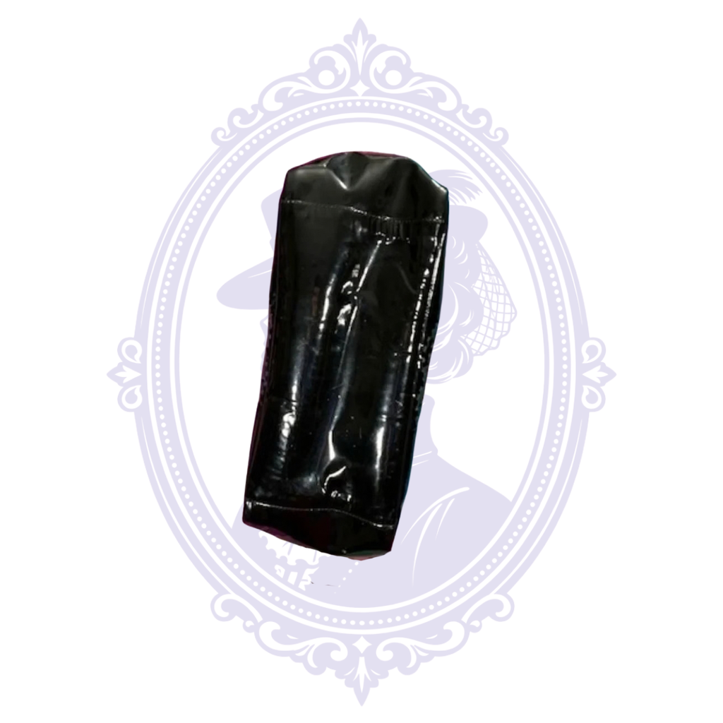 Bottom view of matching black patent leather zippered pouch included with vintage Chanel Triple Coco tote.