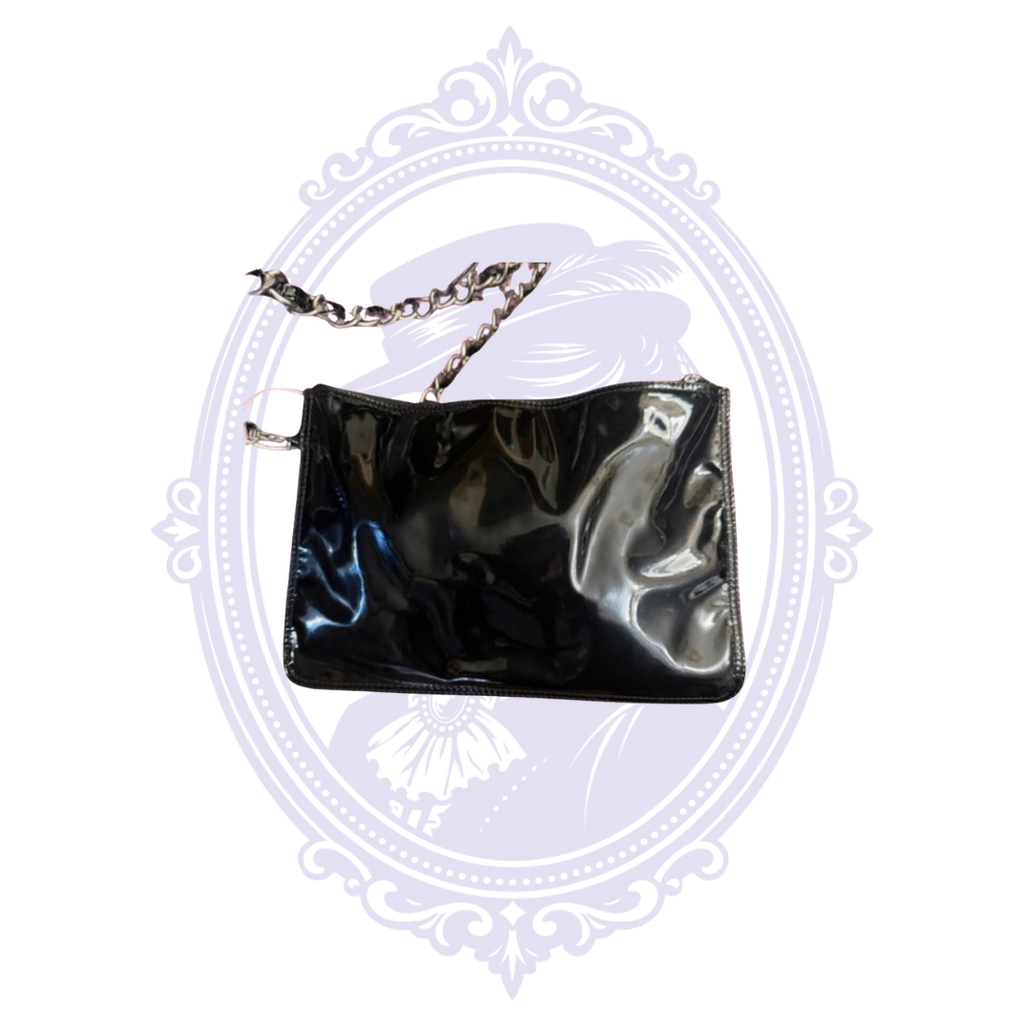 Matching black patent leather zippered pouch with chain attachment from vintage Chanel Triple Coco tote.