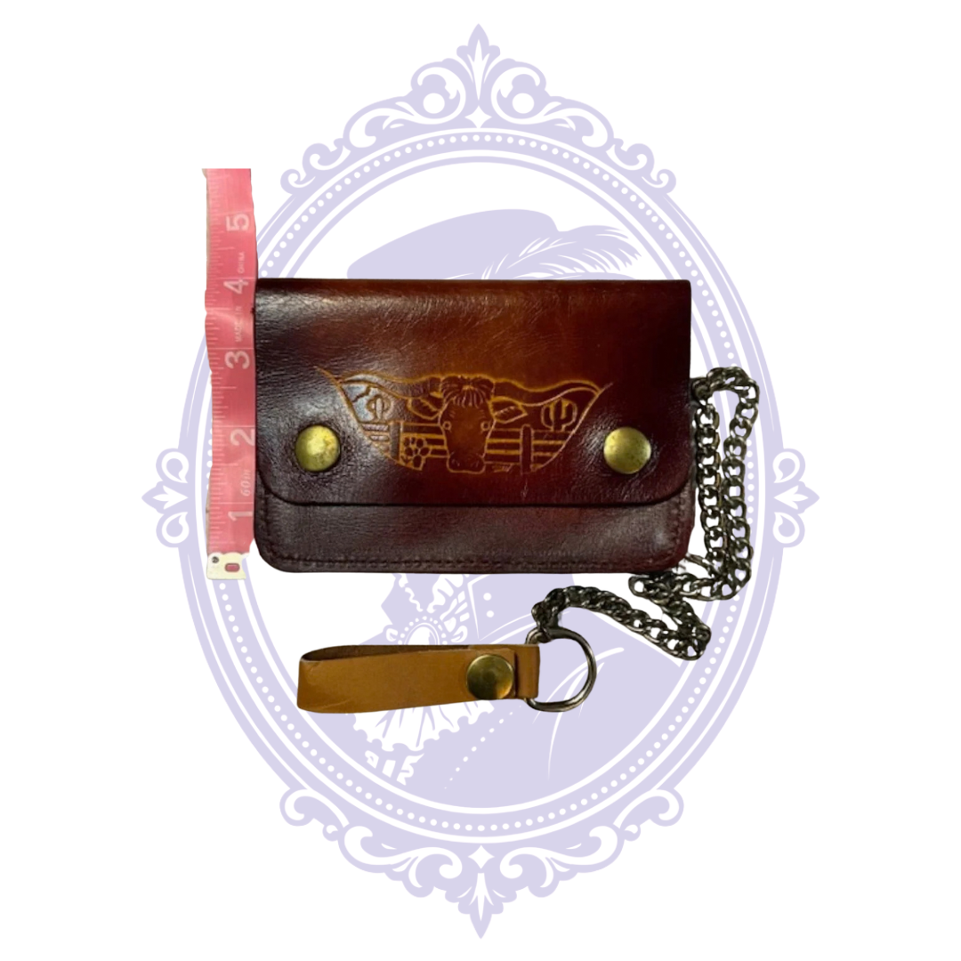 Vintage longhorn leather trucker wallet BBL-07 beside measuring tape showing approximately three and a half inches height when closed.