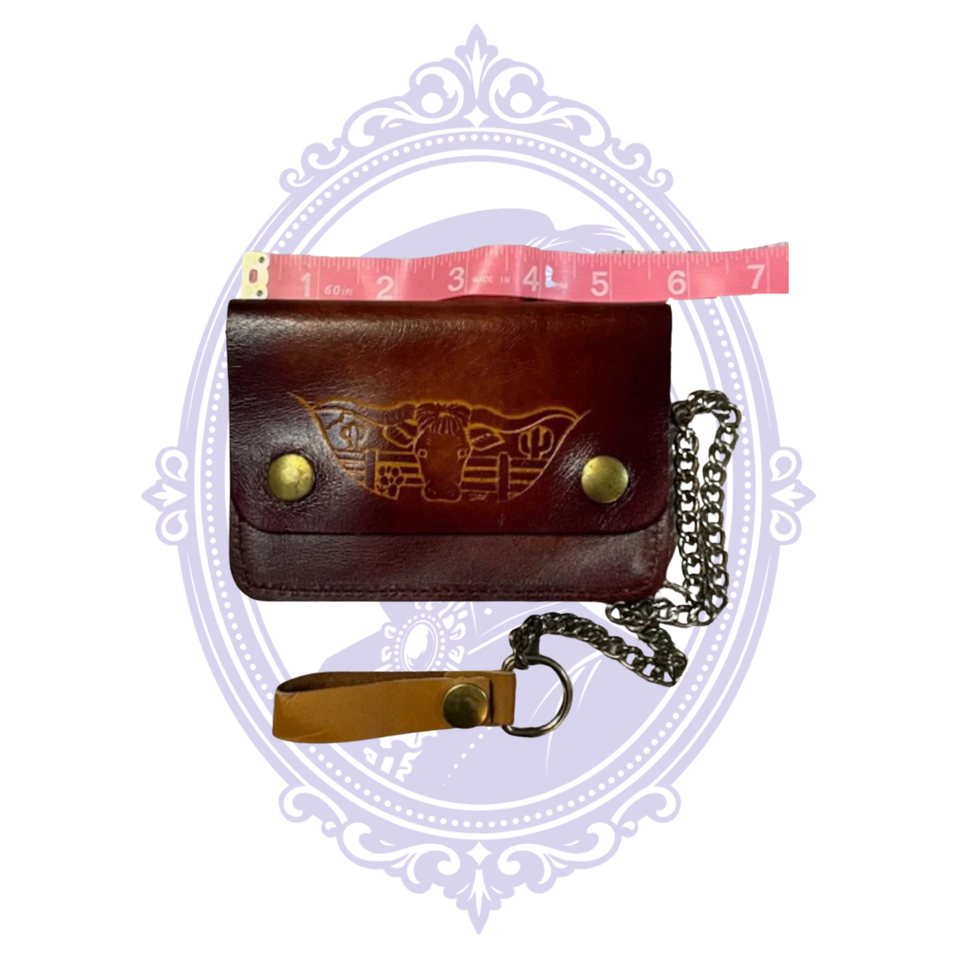 Vintage longhorn leather trucker wallet BBL-07 with measuring tape across the front showing approximately five inches width when closed.