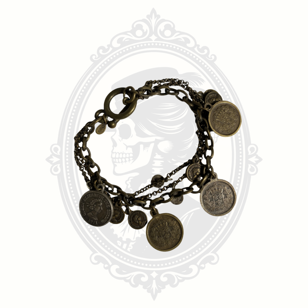 Vintage Premier Designs gold-tone chain bracelet featuring multiple strands with coin-style charm accents in a layered design.