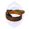 Vintage brown leather Harley-Davidson belt, size 28, coiled to show winged lettering design, tan leather underside and snap fastening.