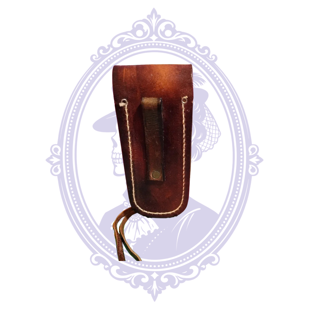 Back of vintage Harley-Davidson brown leather knife sheath with fixed belt loop and contrasting stitching.