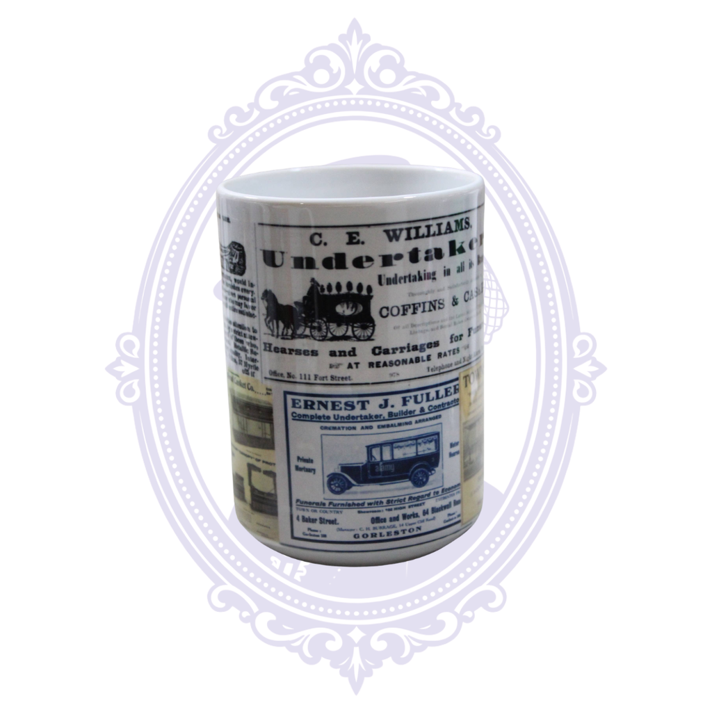 Vintage undertaker advertising mug featuring coffins, caskets, a horse-drawn hearse and an early motor hearse.