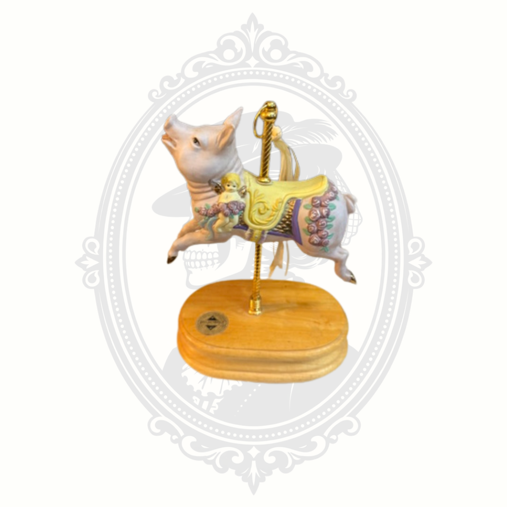 Whimsical carousel pig figurine collectible with pastel accents and nostalgic fairground-inspired design.