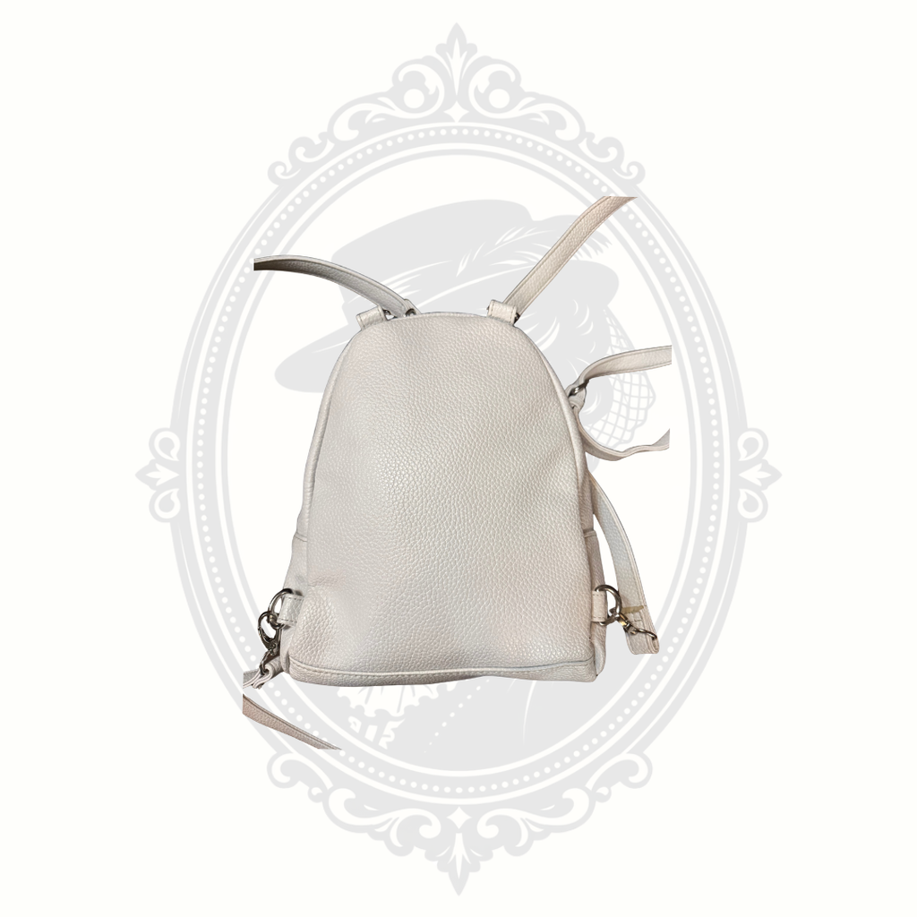 Back view of white mini backpack purse with adjustable straps and textured finish